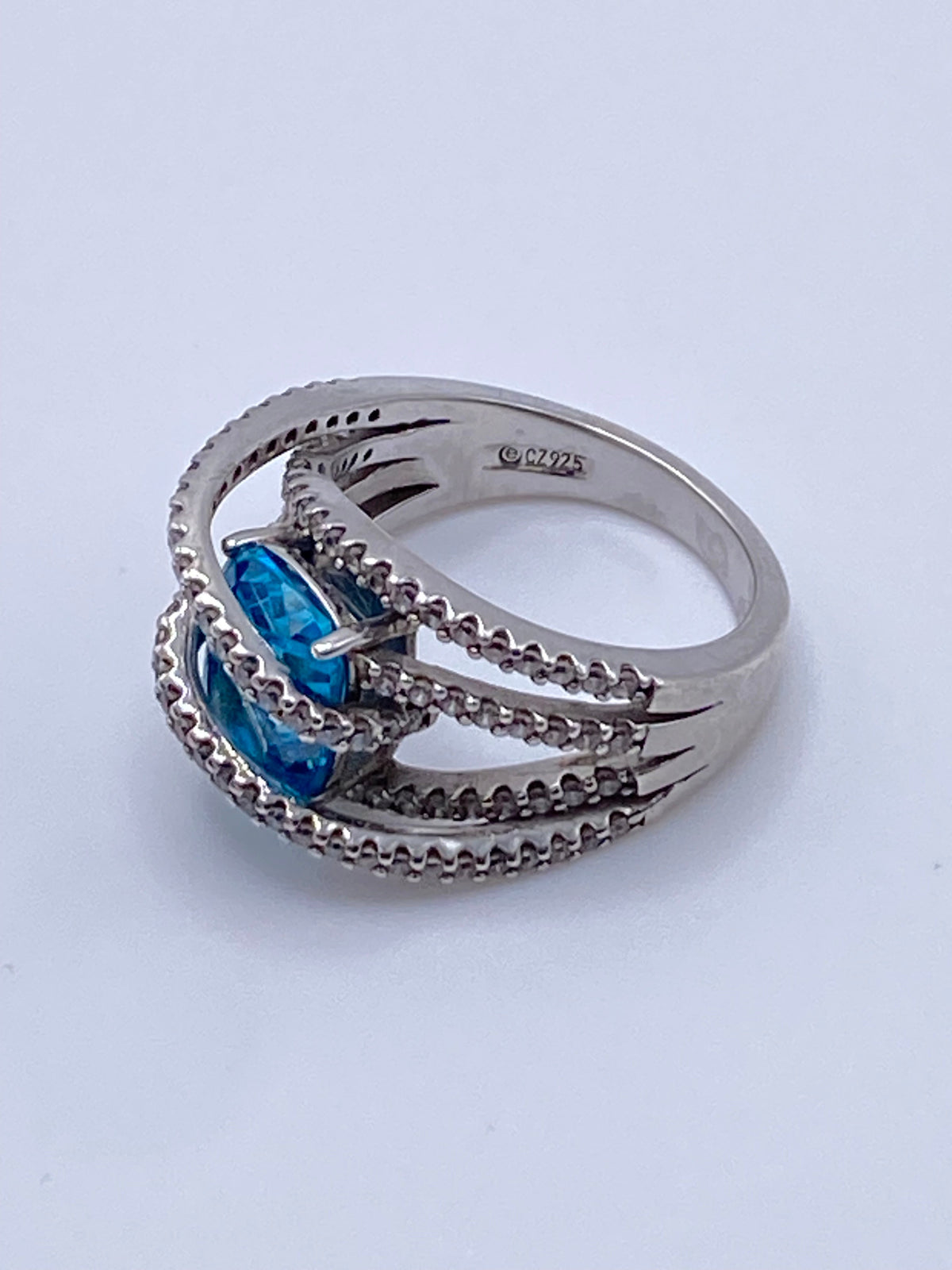 Sterling Silver Blue Topaz Bypass Ring with Cubic Zirconia Accents