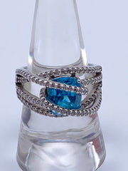Sterling Silver Blue Topaz Bypass Ring with Cubic Zirconia Accents
