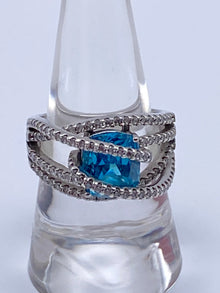 Sterling Silver Blue Topaz Bypass Ring with Cubic Zirconia Accents
