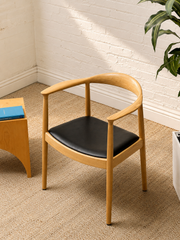 Modern Sculptural Oak Horseshoe Armchair with Black Seat