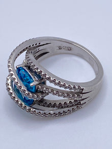 Sterling Silver Blue Topaz Bypass Ring with Cubic Zirconia Accents
