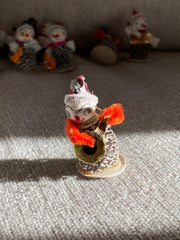 Spun Cotton and Pinecone Snowman Playing Guitar