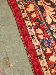 Large Persian Rug as Found
