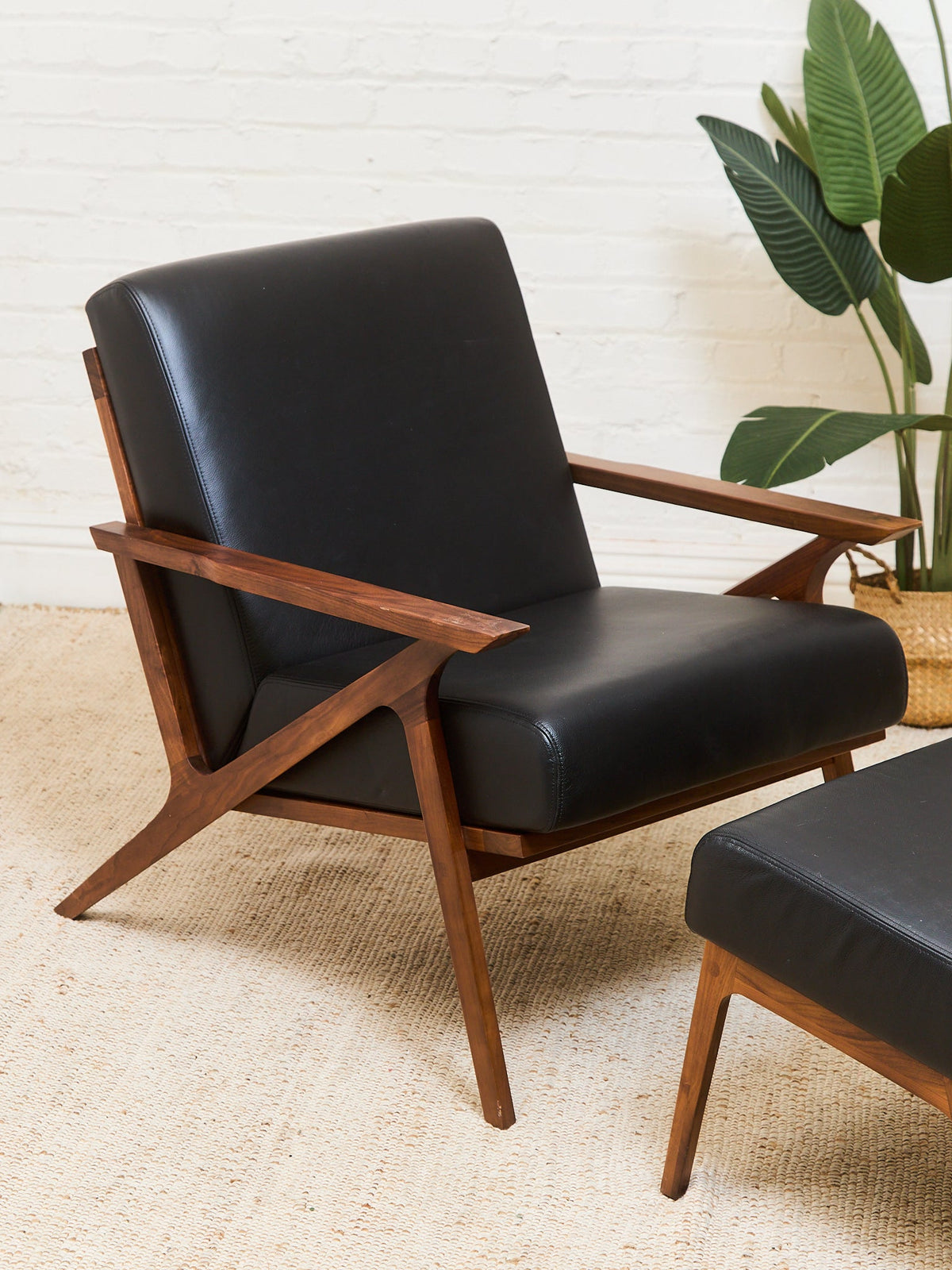 Black Leather Chair and Ottoman