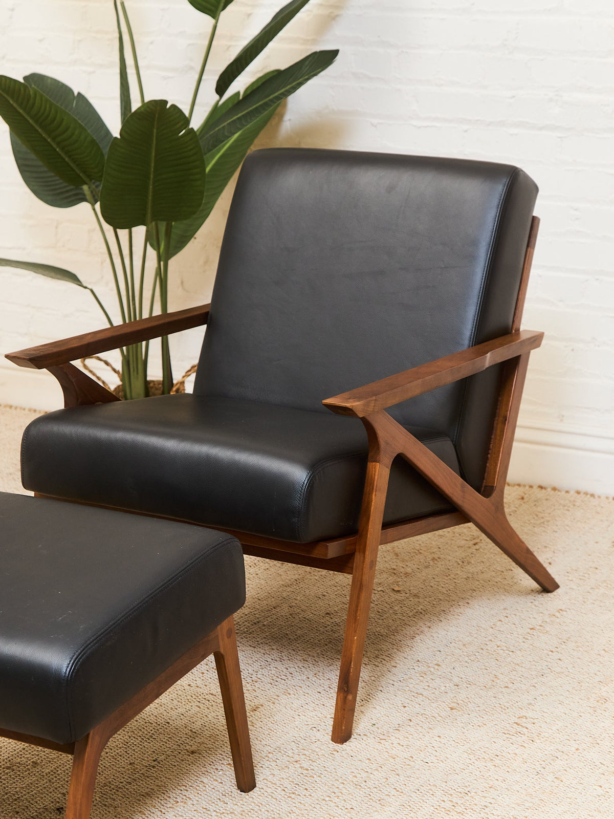 Black Leather Chair and Ottoman