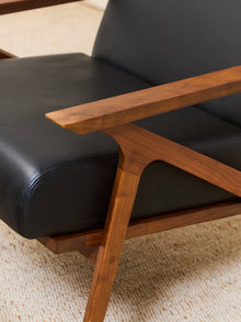 Black Leather Chair and Ottoman