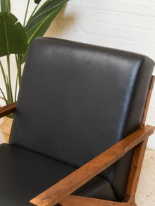 Black Leather Chair and Ottoman