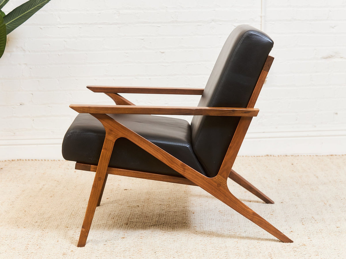 Black Leather Chair and Ottoman