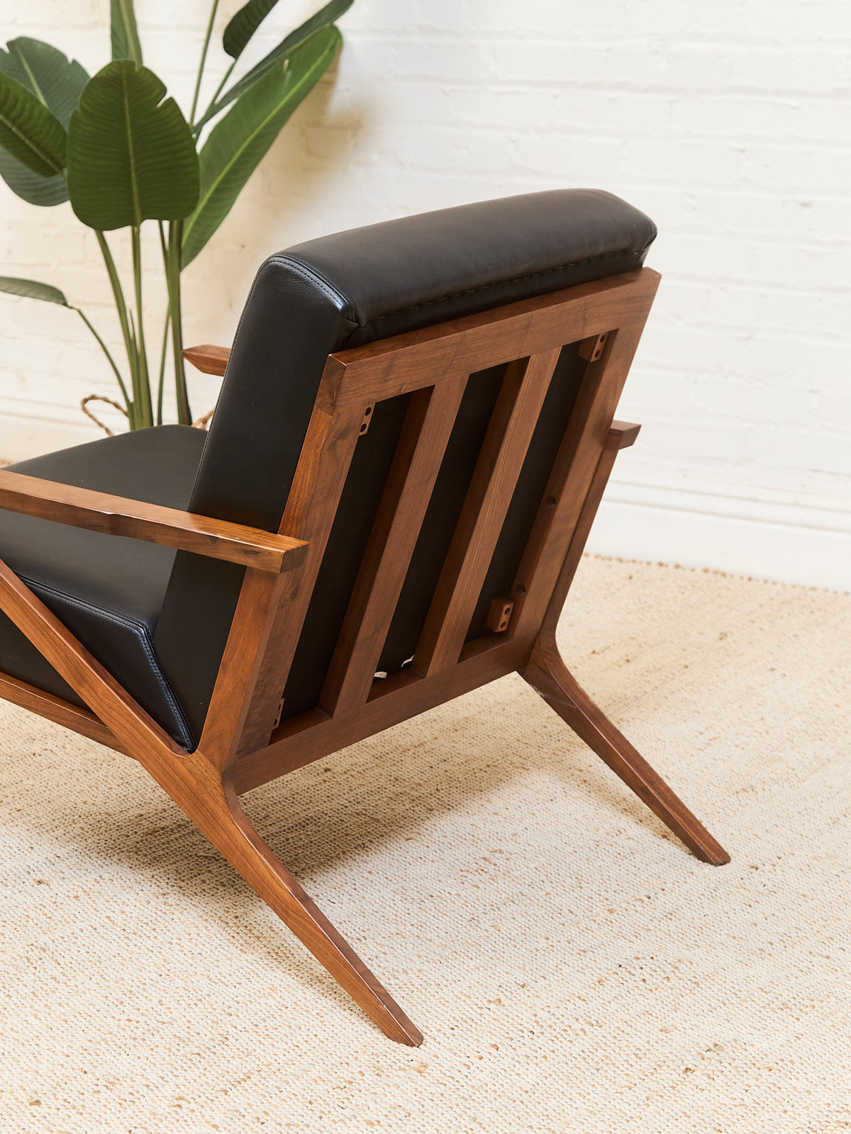 Black Leather Chair and Ottoman