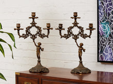 Pair of Italian Cherub Candelabras