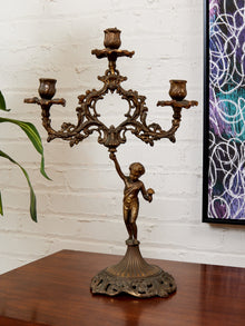 Pair of Italian Cherub Candelabras