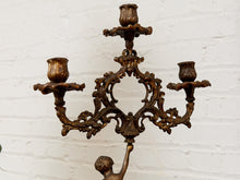 Pair of Italian Cherub Candelabras