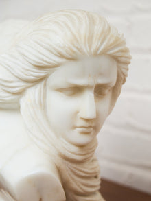Carved Marble Bust of a Woman