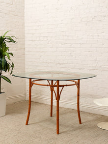Vintage Bamboo-Style Orange Round Dining Table with Glass Top