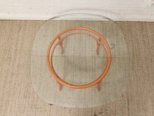 Vintage Bamboo-Style Orange Round Dining Table with Glass Top
