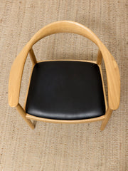 Modern Sculptural Oak Horseshoe Armchair with Black Seat