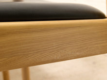 Modern Sculptural Oak Horseshoe Armchair with Black Seat