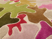 Modern Abstract Area Rug in Olive and Berry Tones