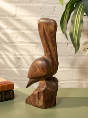 Hand-Carved Wooden Pelican Sculpture on Driftwood Base