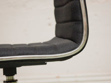 Armless Ribbed Swivel Office Chair in Black Upholstery
