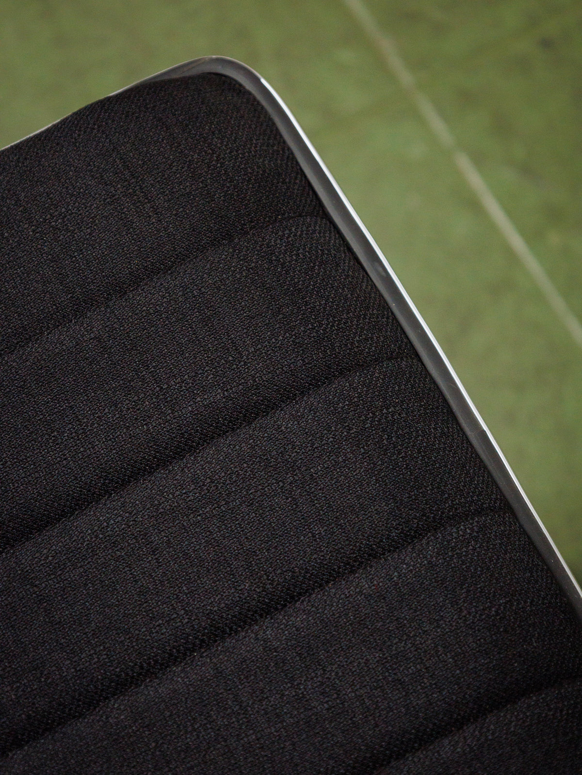 Armless Ribbed Swivel Office Chair in Black Upholstery