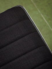 Armless Ribbed Swivel Office Chair in Black Upholstery