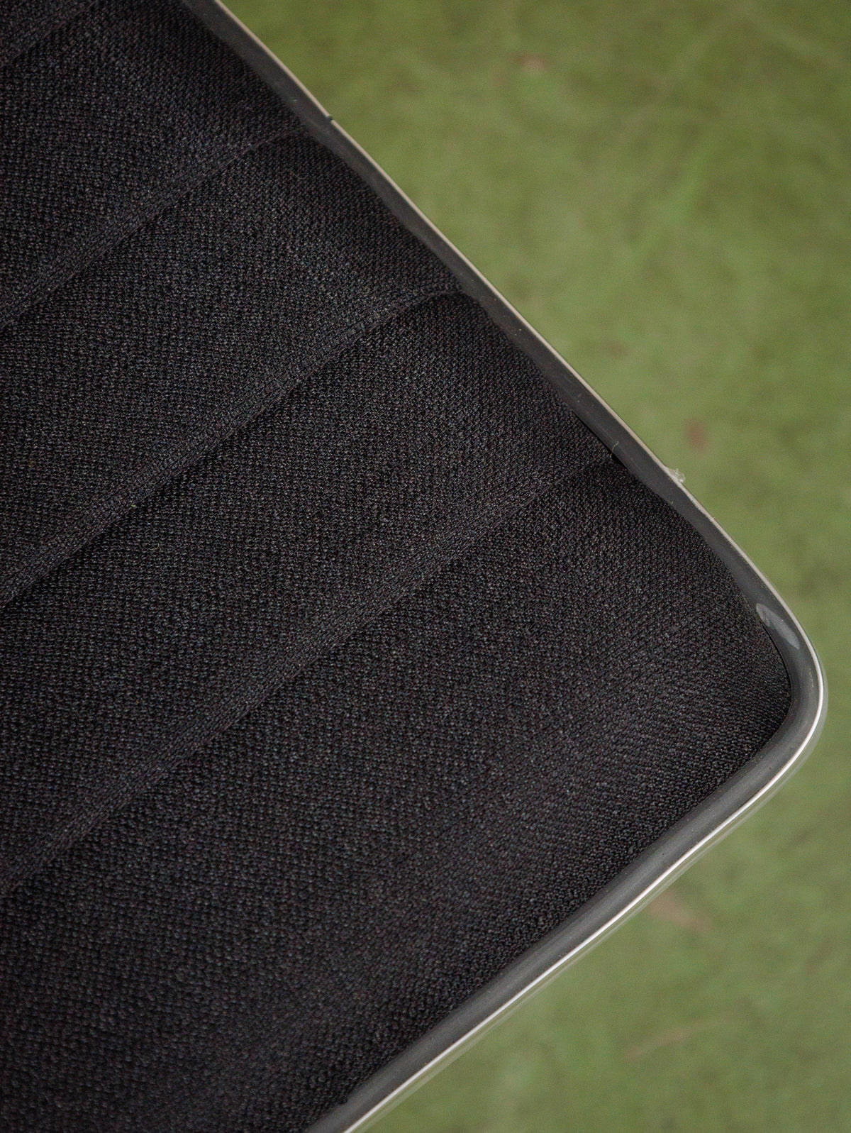 Armless Ribbed Swivel Office Chair in Black Upholstery