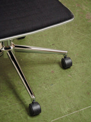 Armless Ribbed Swivel Office Chair in Black Upholstery