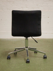 Armless Ribbed Swivel Office Chair in Black Upholstery