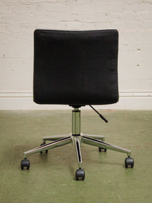 Armless Ribbed Swivel Office Chair in Black Upholstery