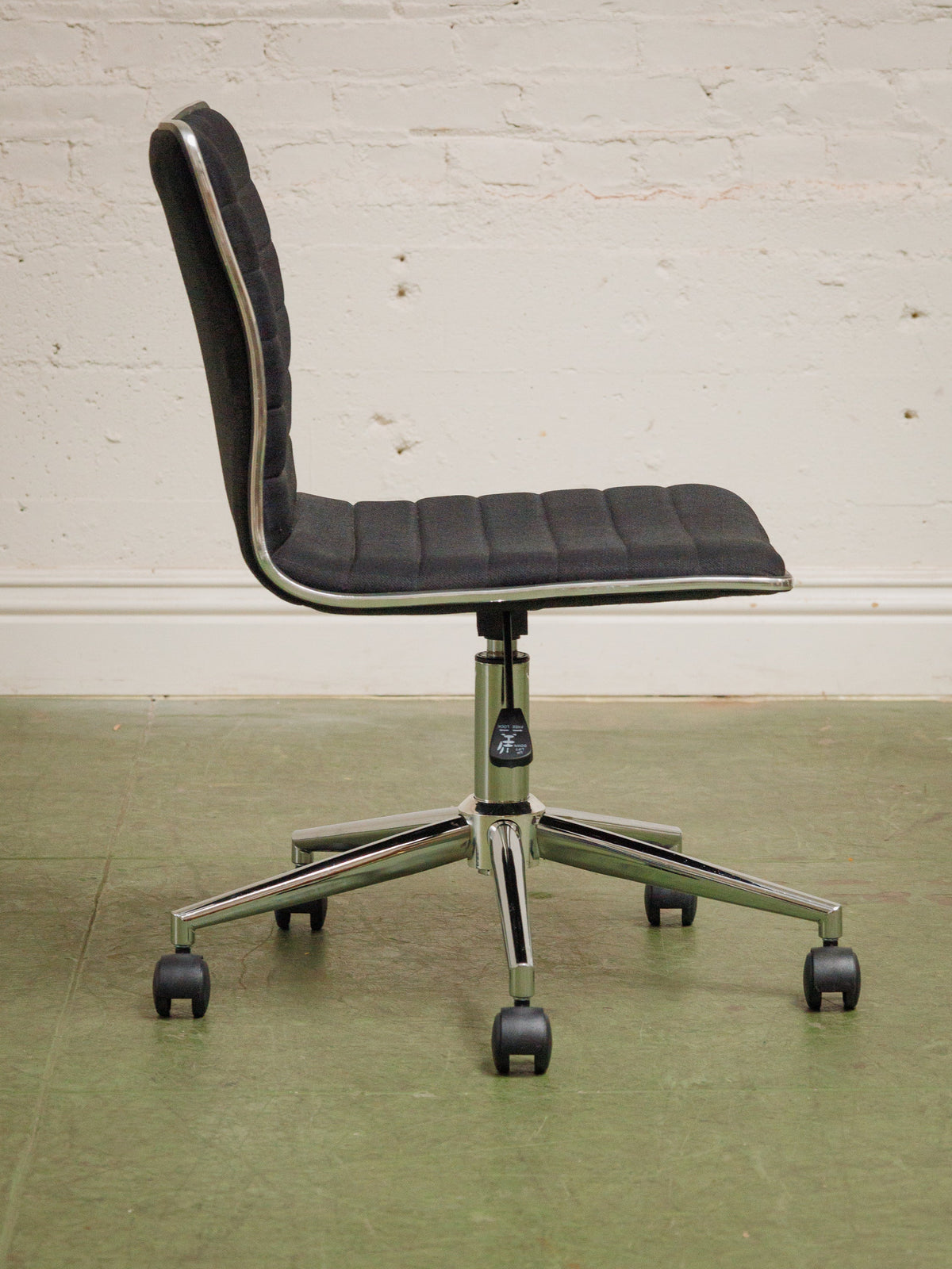 Armless Ribbed Swivel Office Chair in Black Upholstery