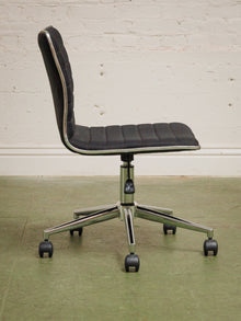 Armless Ribbed Swivel Office Chair in Black Upholstery
