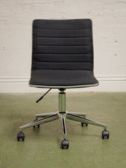 Armless Ribbed Swivel Office Chair in Black Upholstery